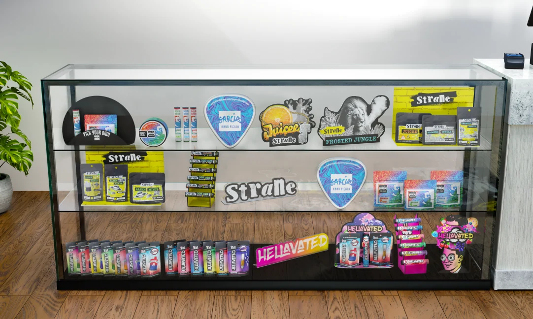 Glass retail cabinet showcasing Strane and other Holistic brands